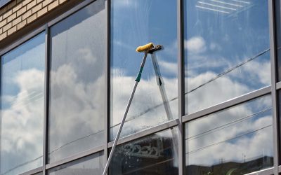 window washing, washing a street shop window building washing